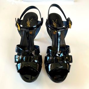 Black YSL Tribute 7.5 sandals in black patent with 4 inch heels
